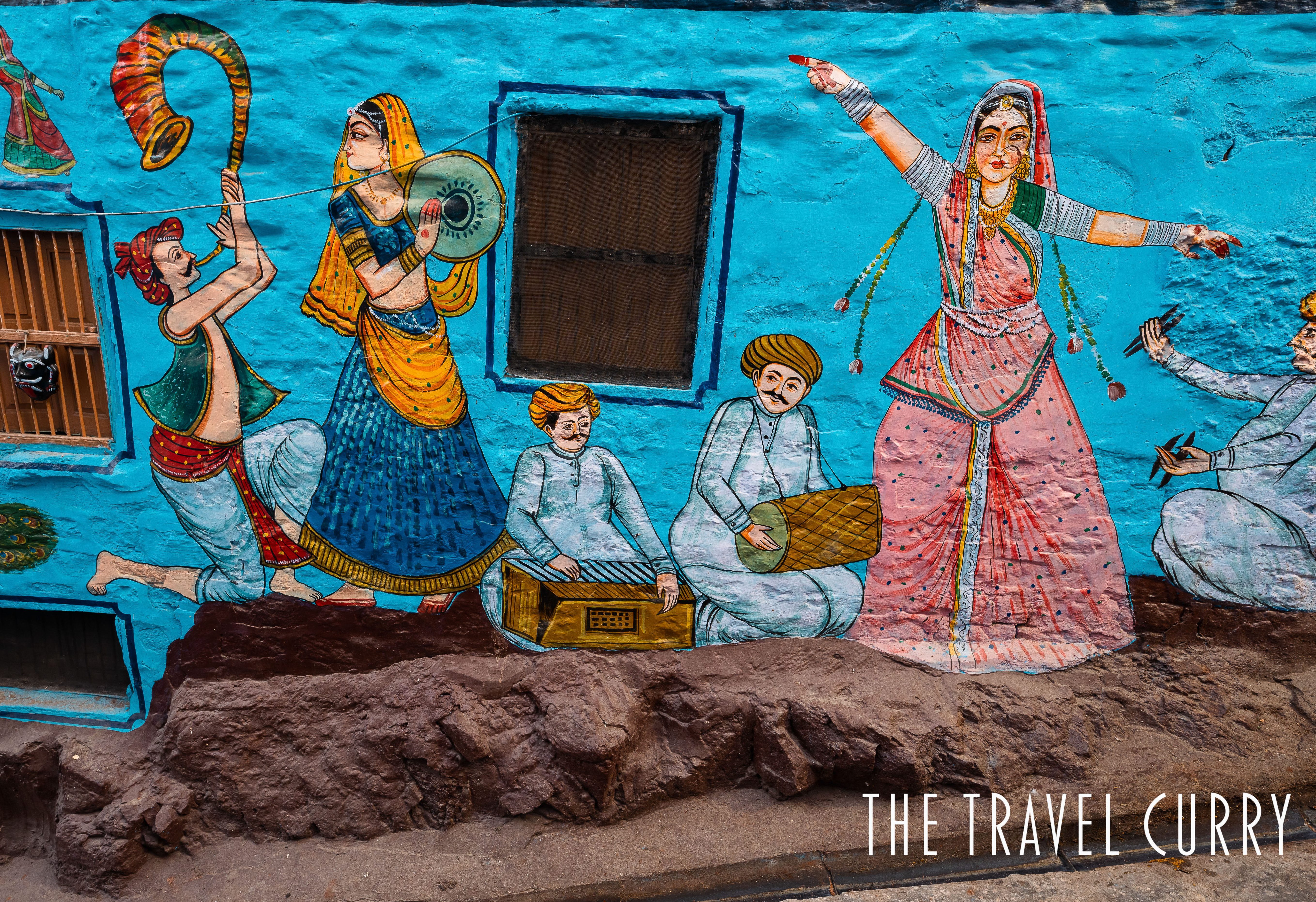 Colorful murals on blue walls of old city Jodhpur