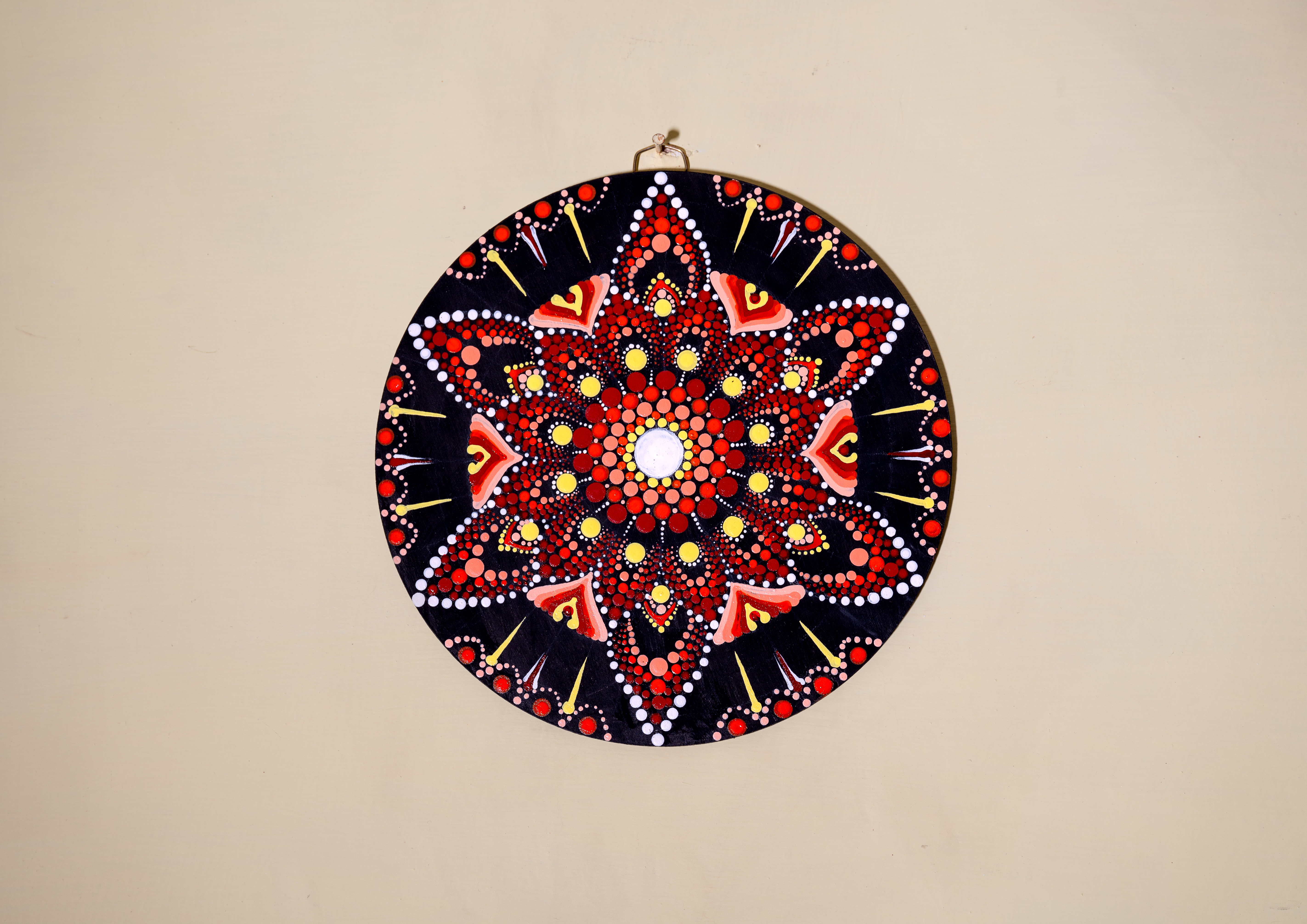 Mandala Wall Plate in reds and yellows