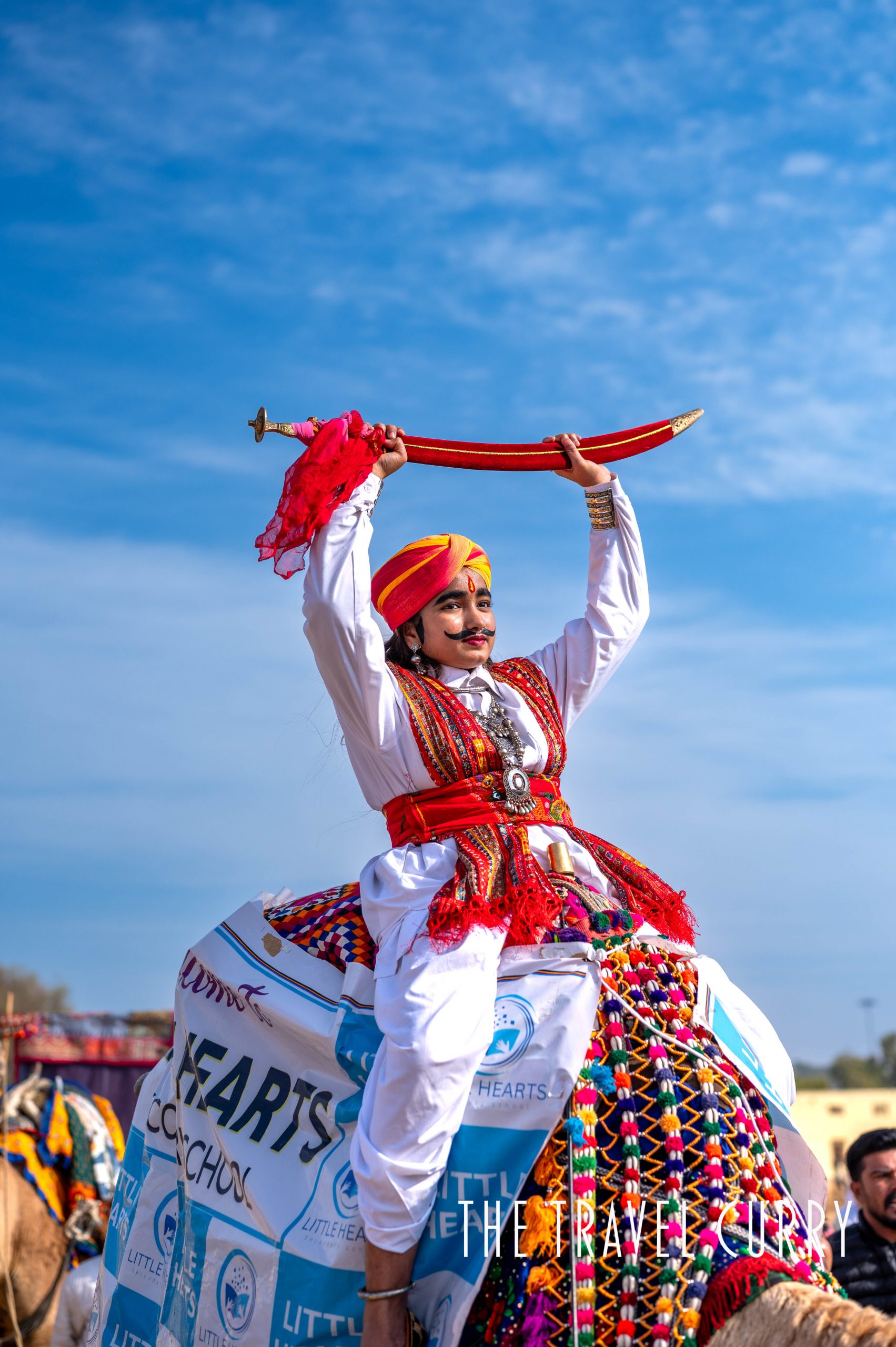 Young girl dressed as Rajput Prince during Jaisalner Desert Festival 2026